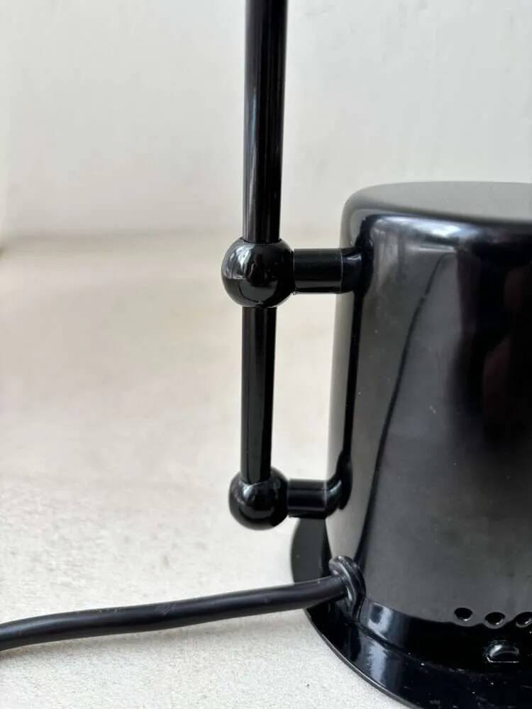 Minimalist Memphis design arc table lamp from the 80s.