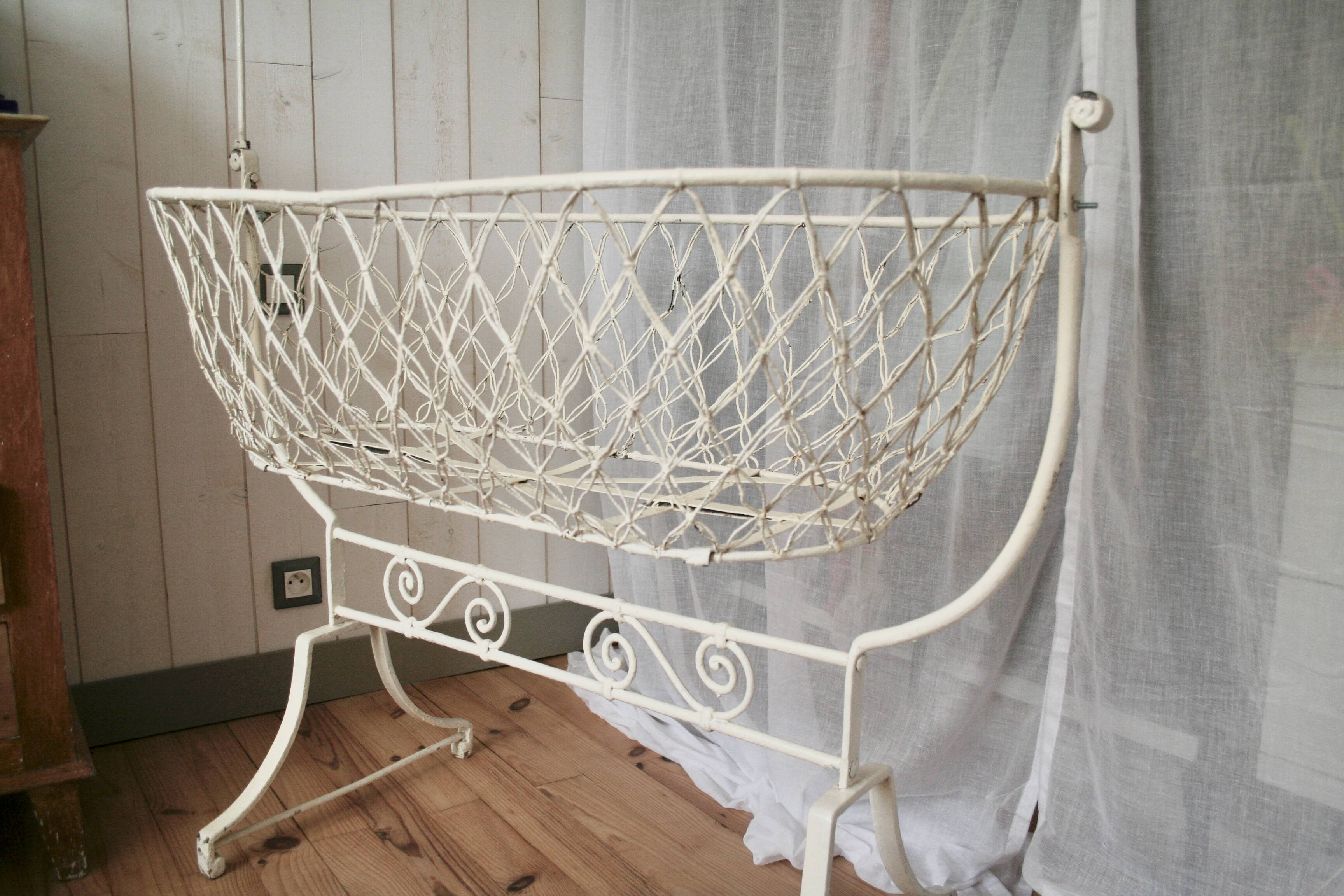 Antique wrought iron rocking chair