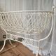 Antique wrought iron rocking chair