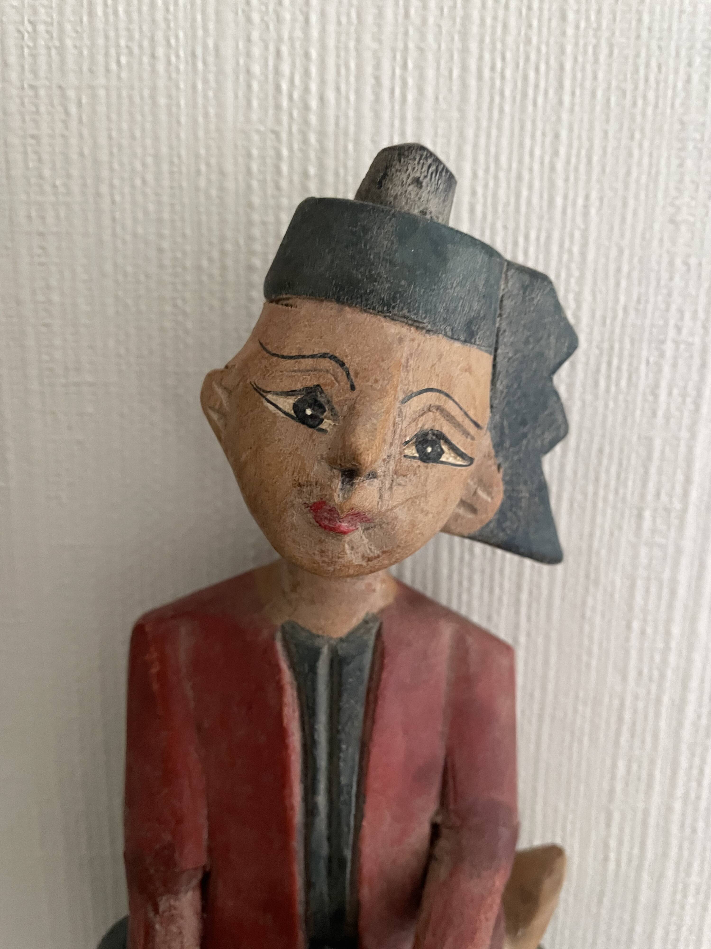 Polychrome wooden statuettes musicians from Asia