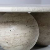 Circular travertine coffee table