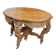 Napoleon III oak table with three extensions, 12 settings, late 19th century.