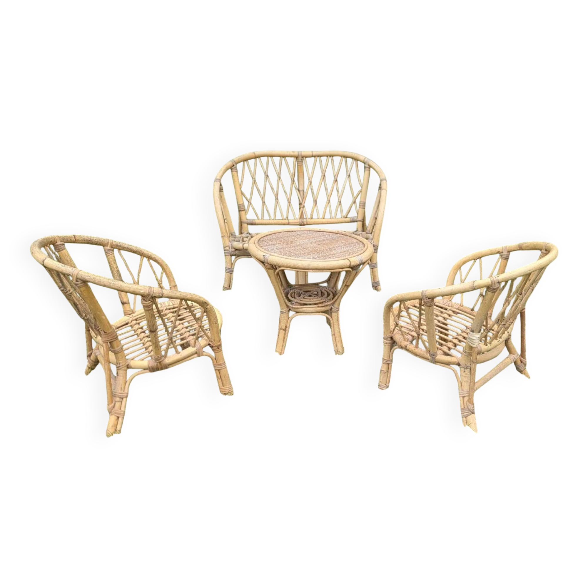 Set of children's rattan garden furniture from the 1950s and 1960s, including chairs, table, and bench.