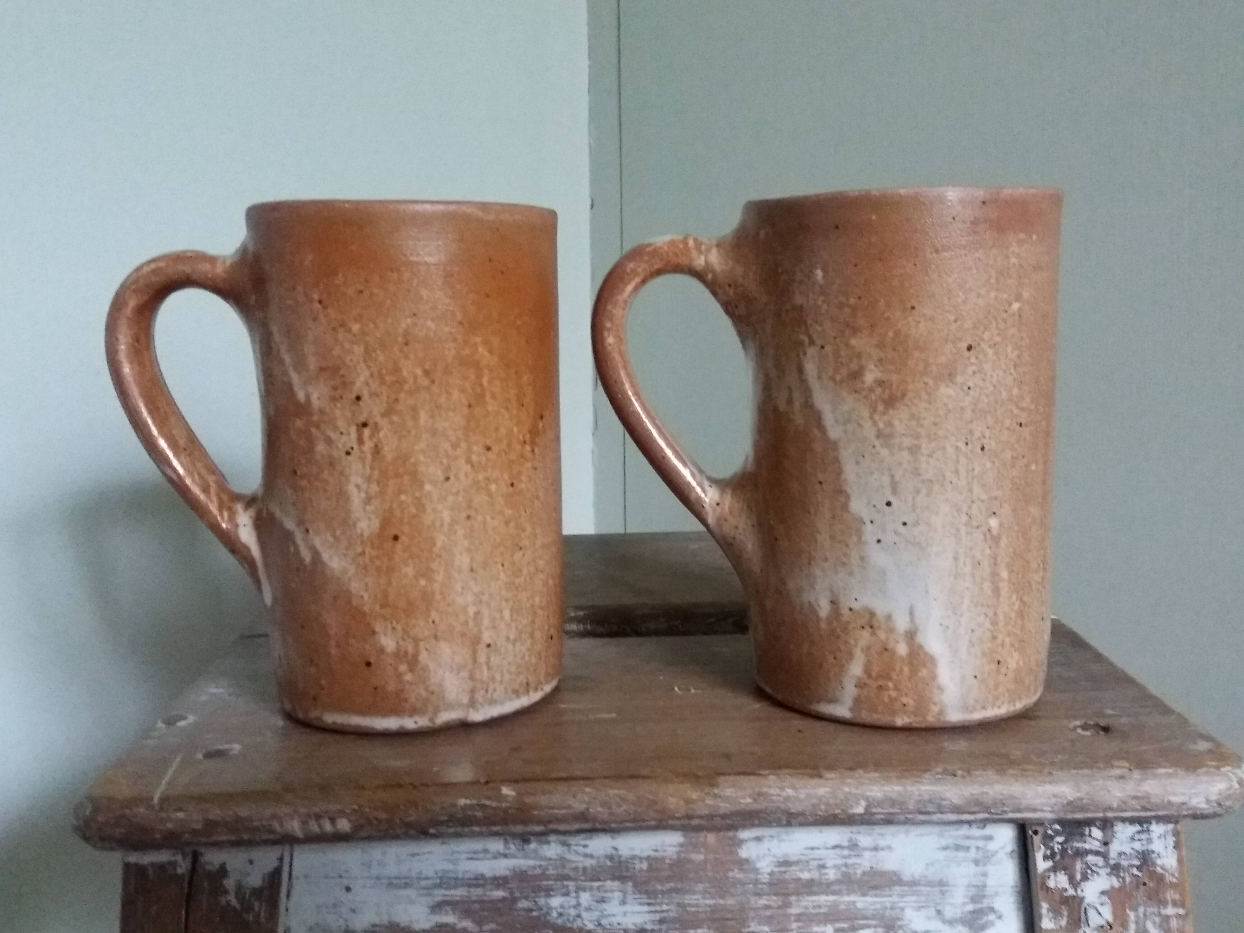 Enamelled stoneware mugs