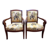 Pair of 19th-century armchairs with a scrolled back