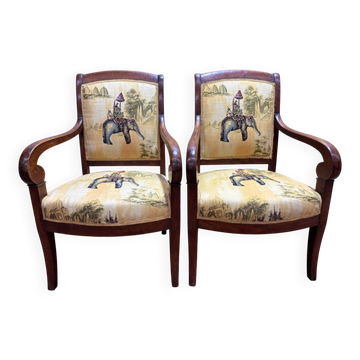 Pair of 19th-century armchairs with a scrolled back