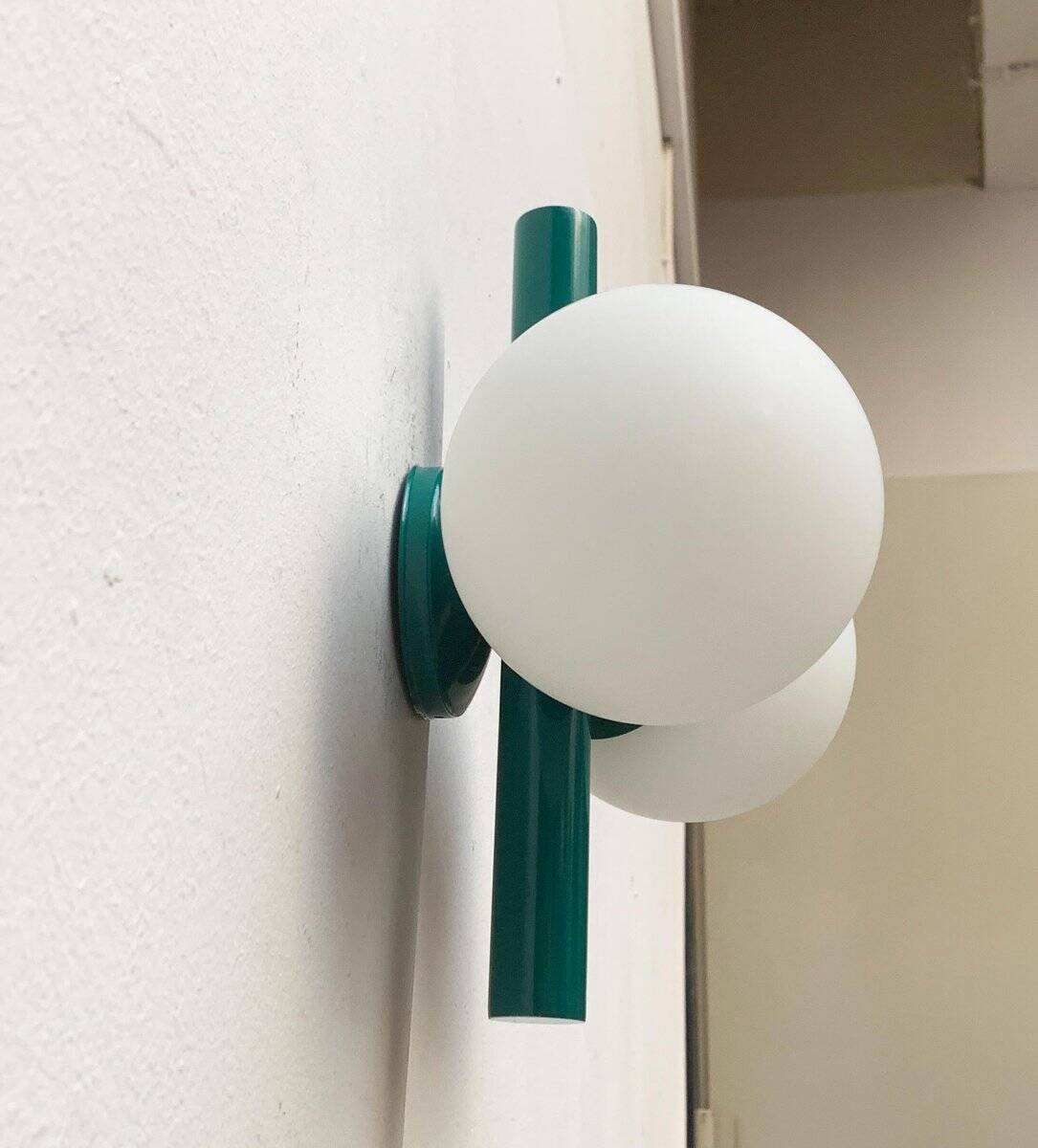 Mid-century German space age wall lamp by Kaiser Idell / Kaiser Leuchten.