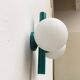 Mid-century German space age wall lamp by Kaiser Idell / Kaiser Leuchten.