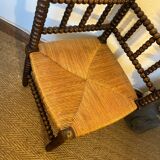 Corner chair in turned wood and straw