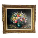Framed bouquet of flowers, oil on canvas signed R Mogisse.