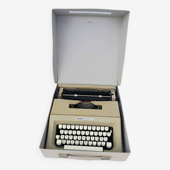Machine à ecrire olivetti lettera 25, années 70, avec sa valise de transport