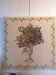 Tapestry of foliage in a Medici vase