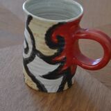 Glazed stoneware mug with snail motif signed