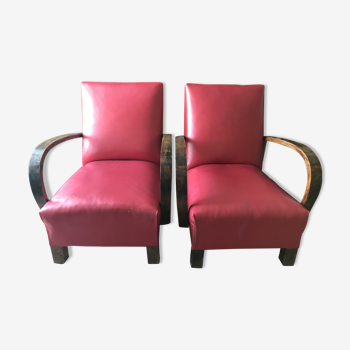 Two red armchairs