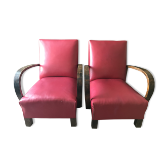 Two red armchairs