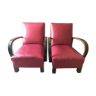 Two red armchairs