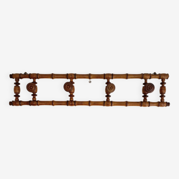 Vintage wooden wall coat rack with 4 swivel hooks from 1920