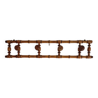 Vintage wooden wall coat rack with 4 swivel hooks from 1920