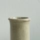 Minimalist beige ceramic vase.