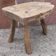 Brutalist coffee table in solid wood, tripod. (Popular art)