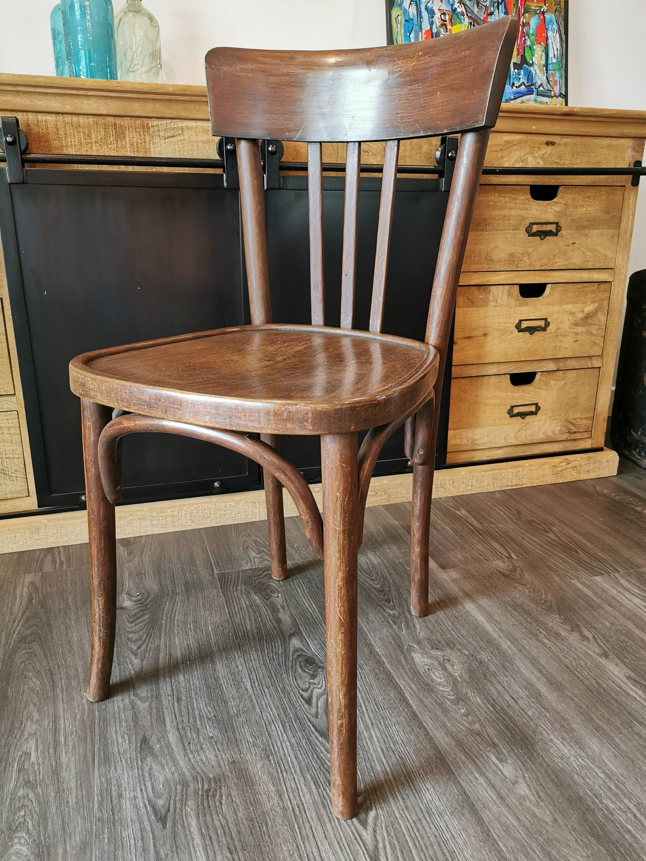 Series of 6 mismatched bistro chairs Baumann and Mahieu