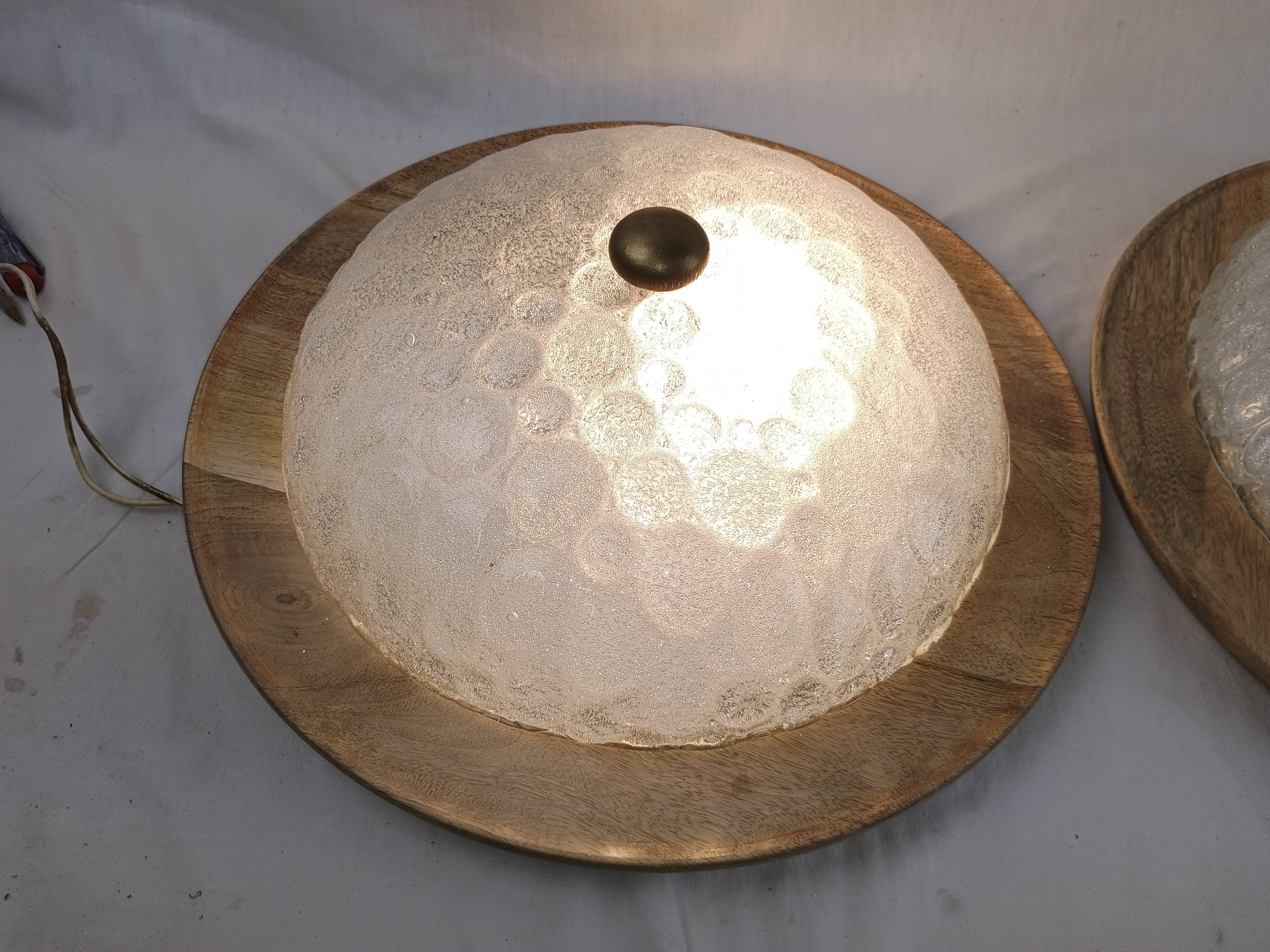 Pair of vintage Murano wall lights with exotic wood shelf.