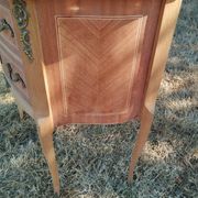 Antique commode with marquetry in the Louis XVI style and marble top.