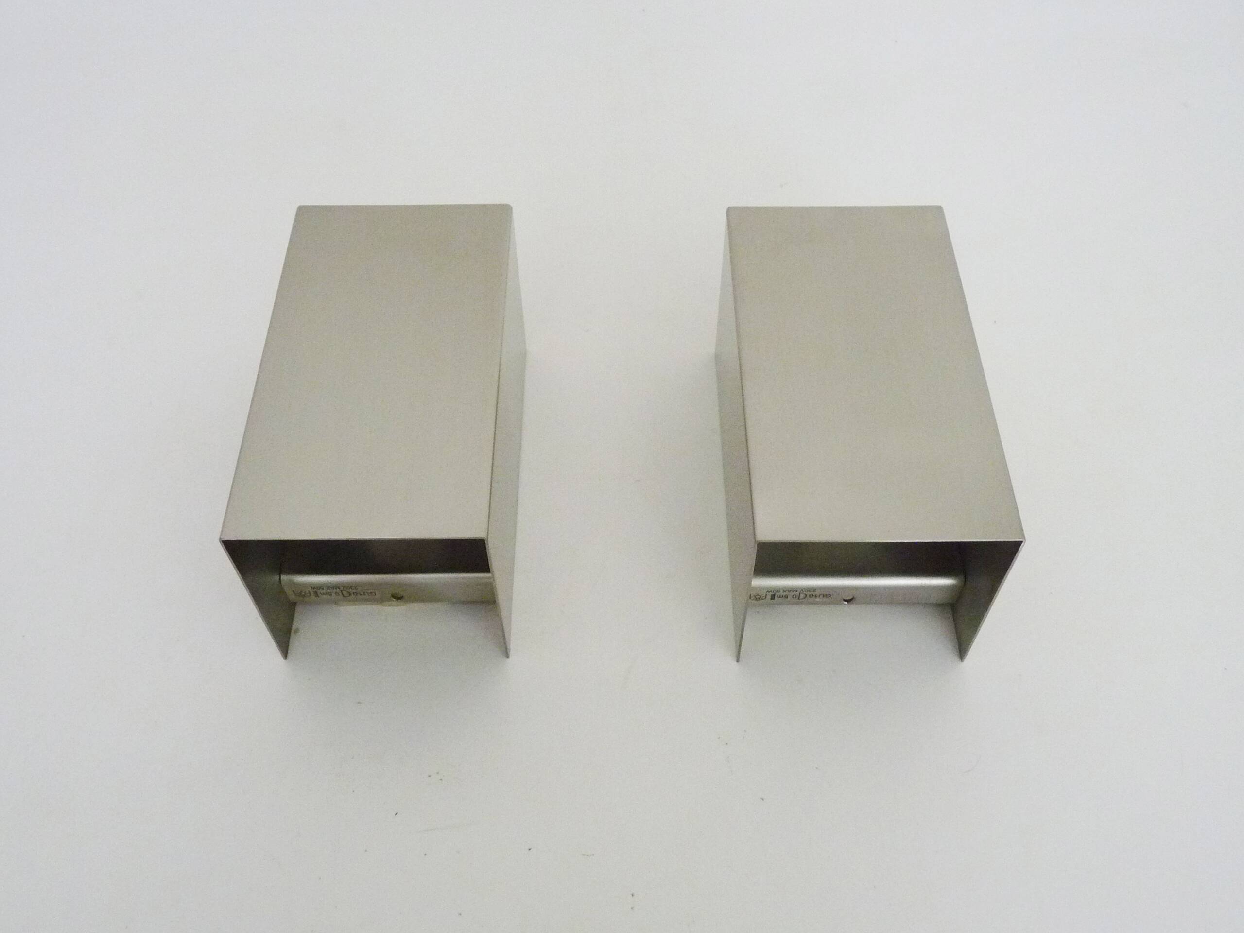 Pair of vintage chrome wall lights in Massive stainless steel