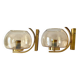 Brass and smoked glass arc wall lights. 1970