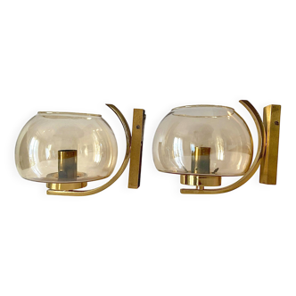 Brass and smoked glass arc wall lights. 1970