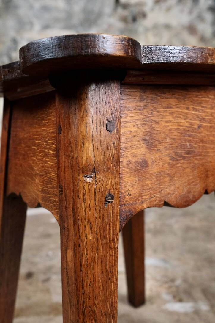 Pair of scalloped oak stools, France, early 20th century