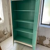 White and green cutter cabinet