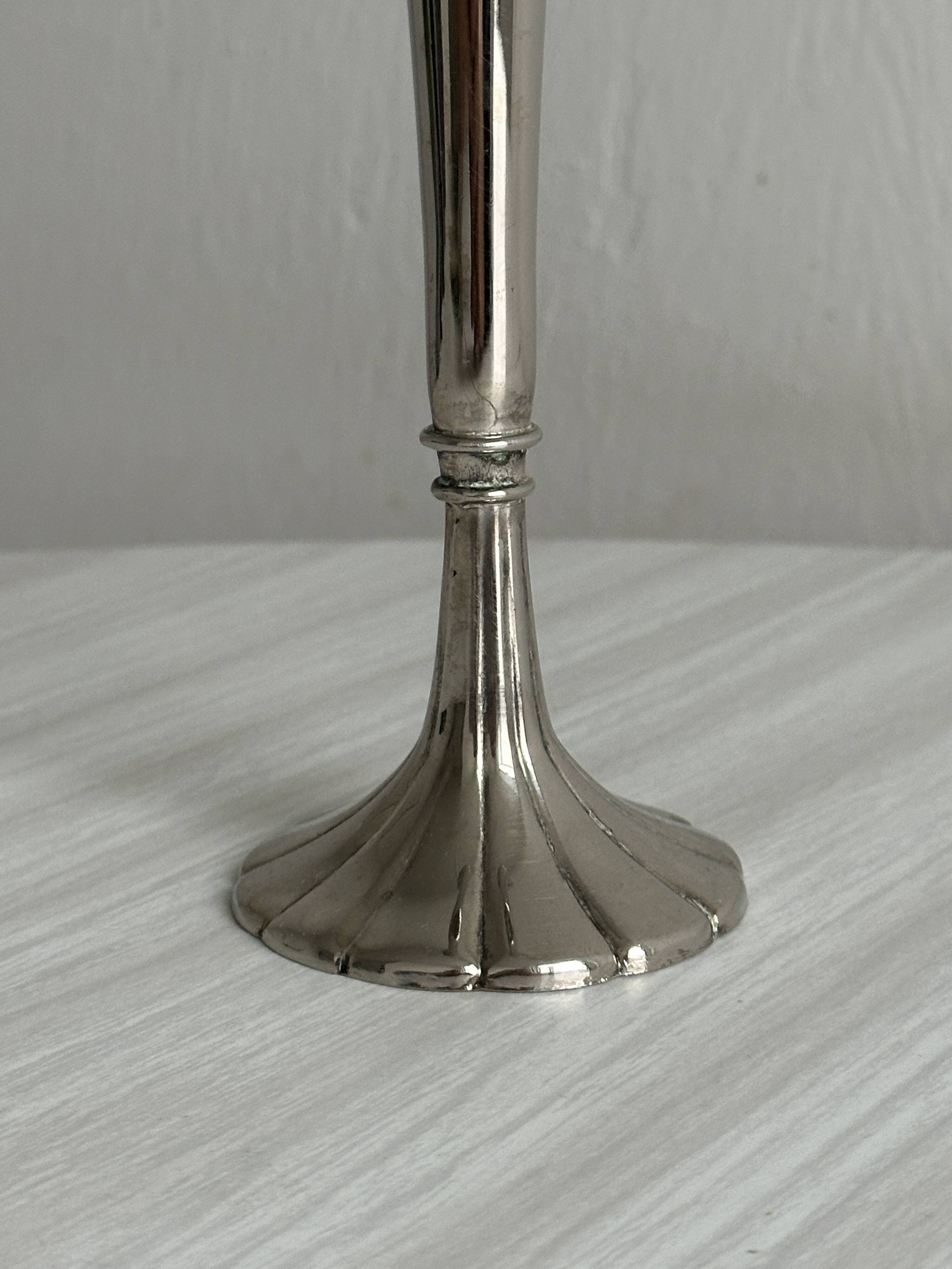 slender chrome metal candlestick
