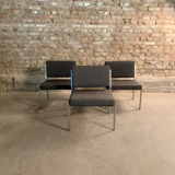 Armchair in metal and grey fabric