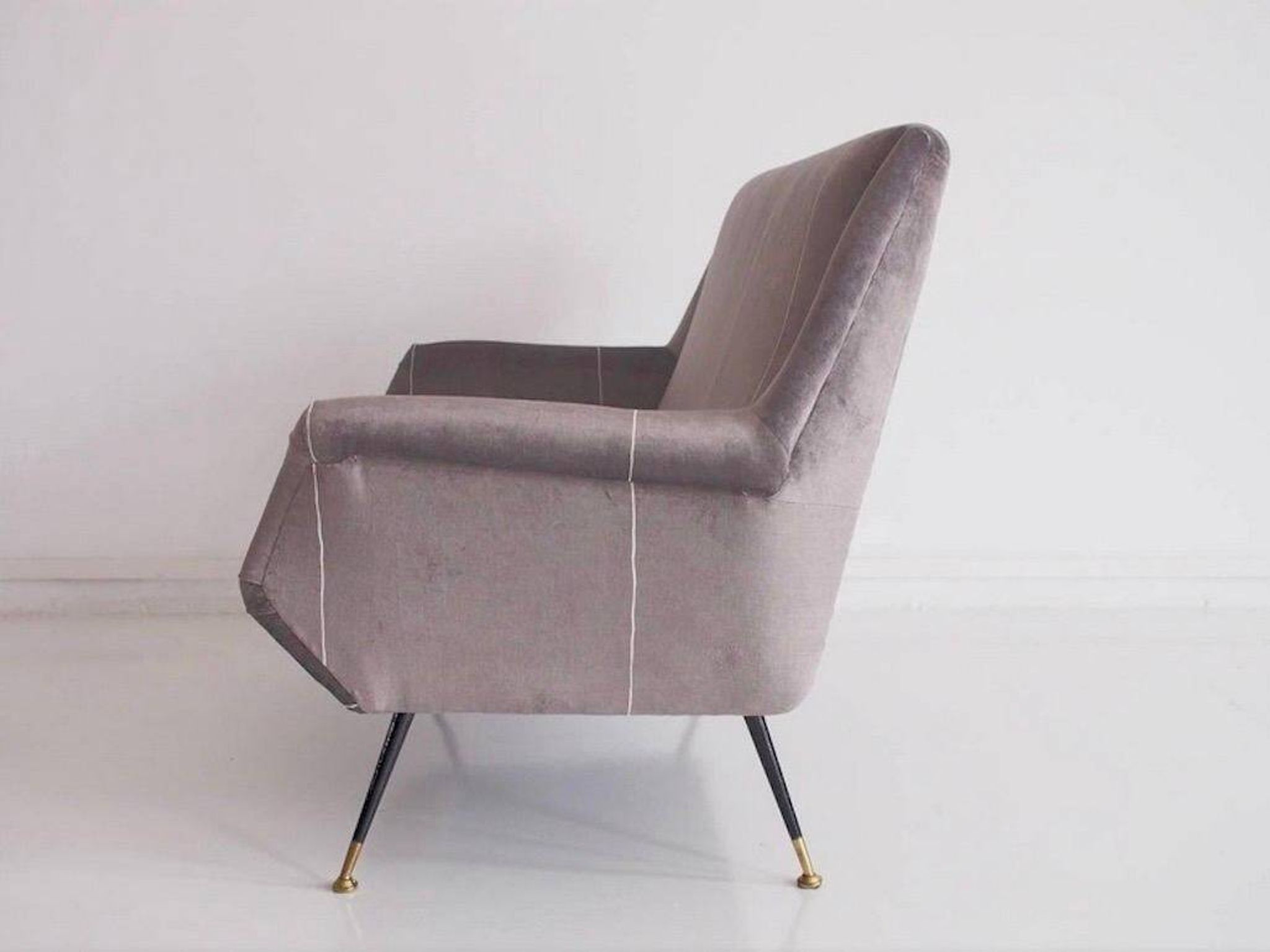 Italian velvet sofa in grey with black lacquered brass legs.