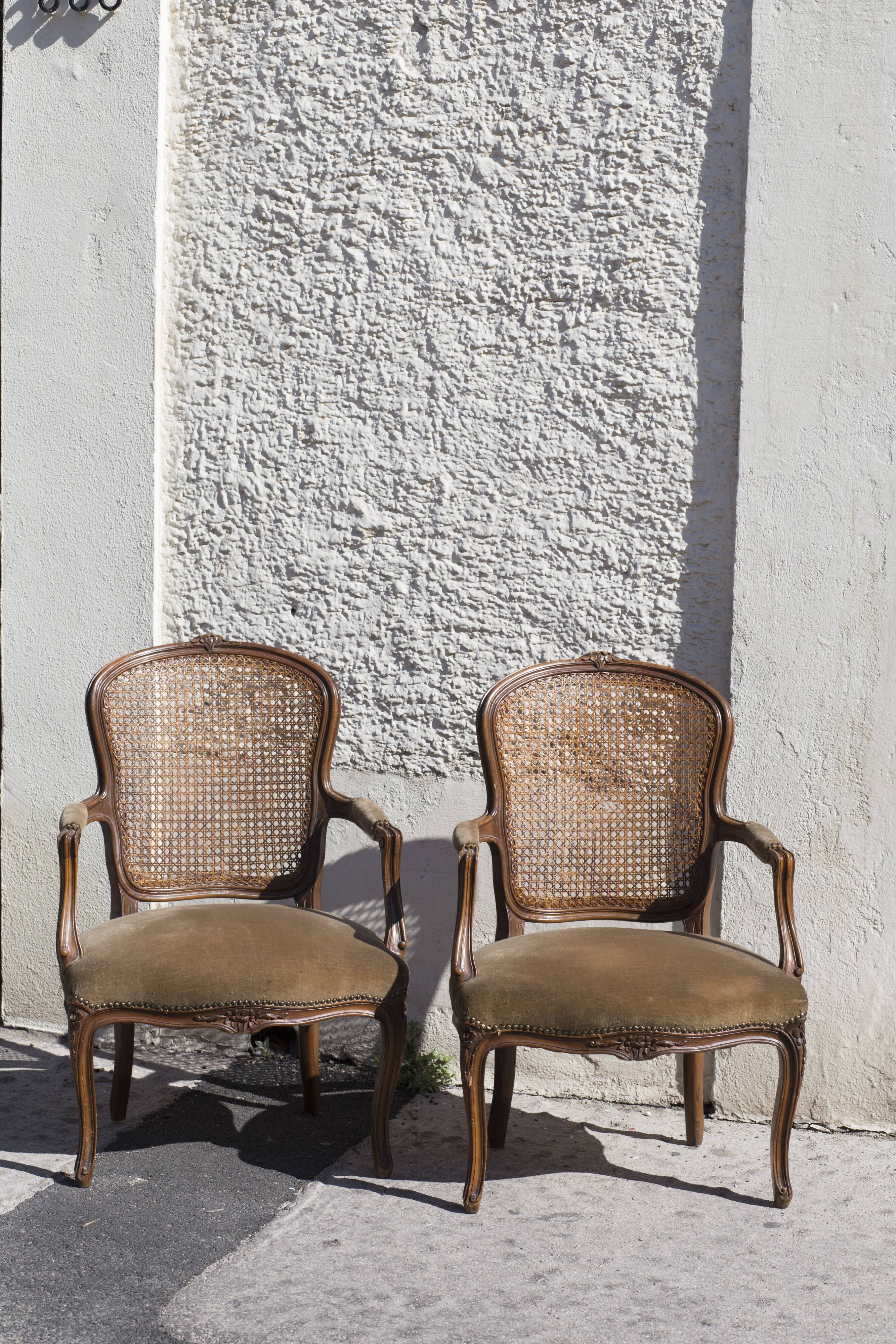 Pair of convertibles caned Louis XV style armchairs