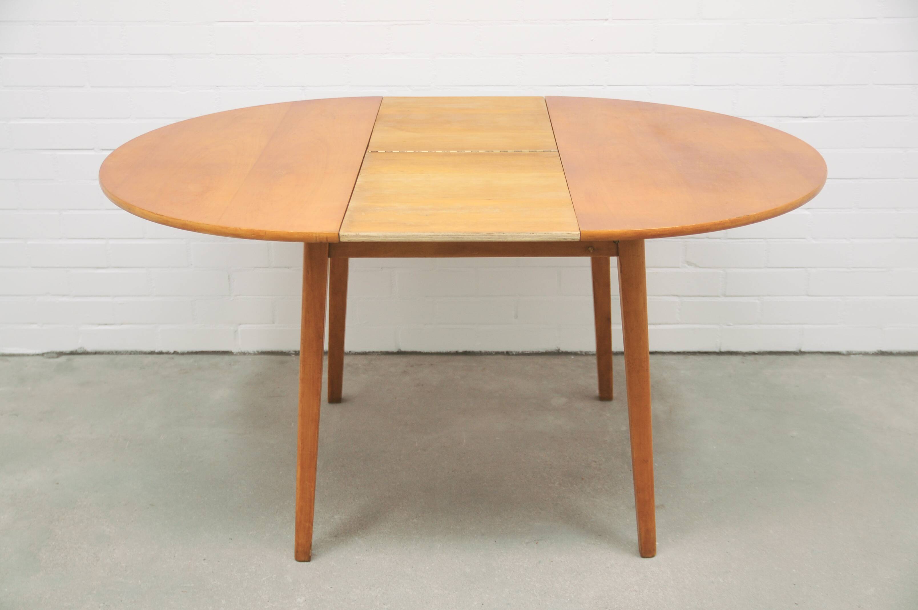 vintage round fold-out dining table