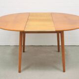 vintage round fold-out dining table