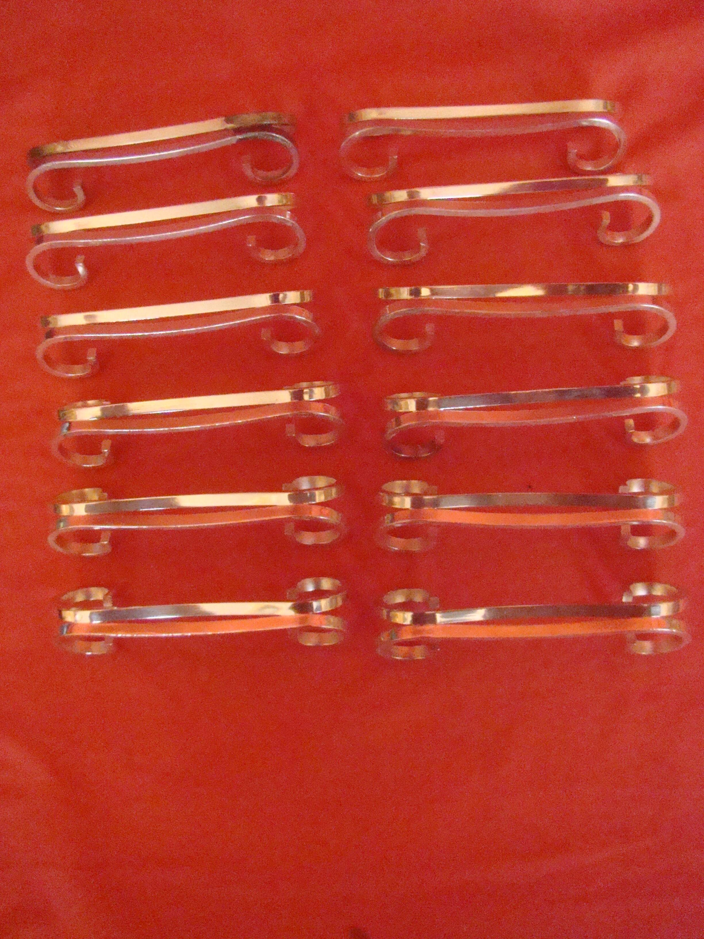 set of 12 silver-plated knife rests from the early 20th century with case