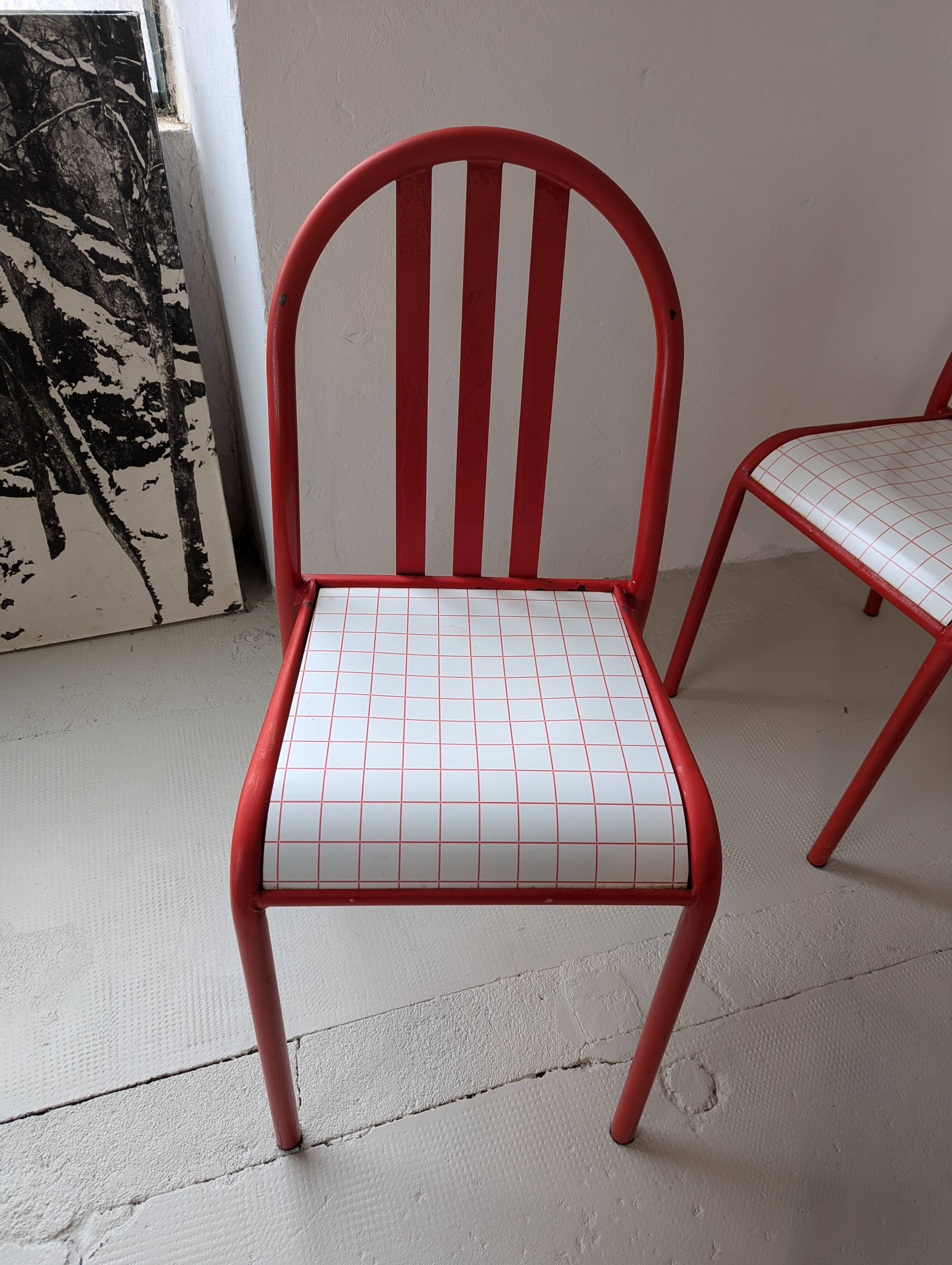 Set of 4 modernist red metal chairs