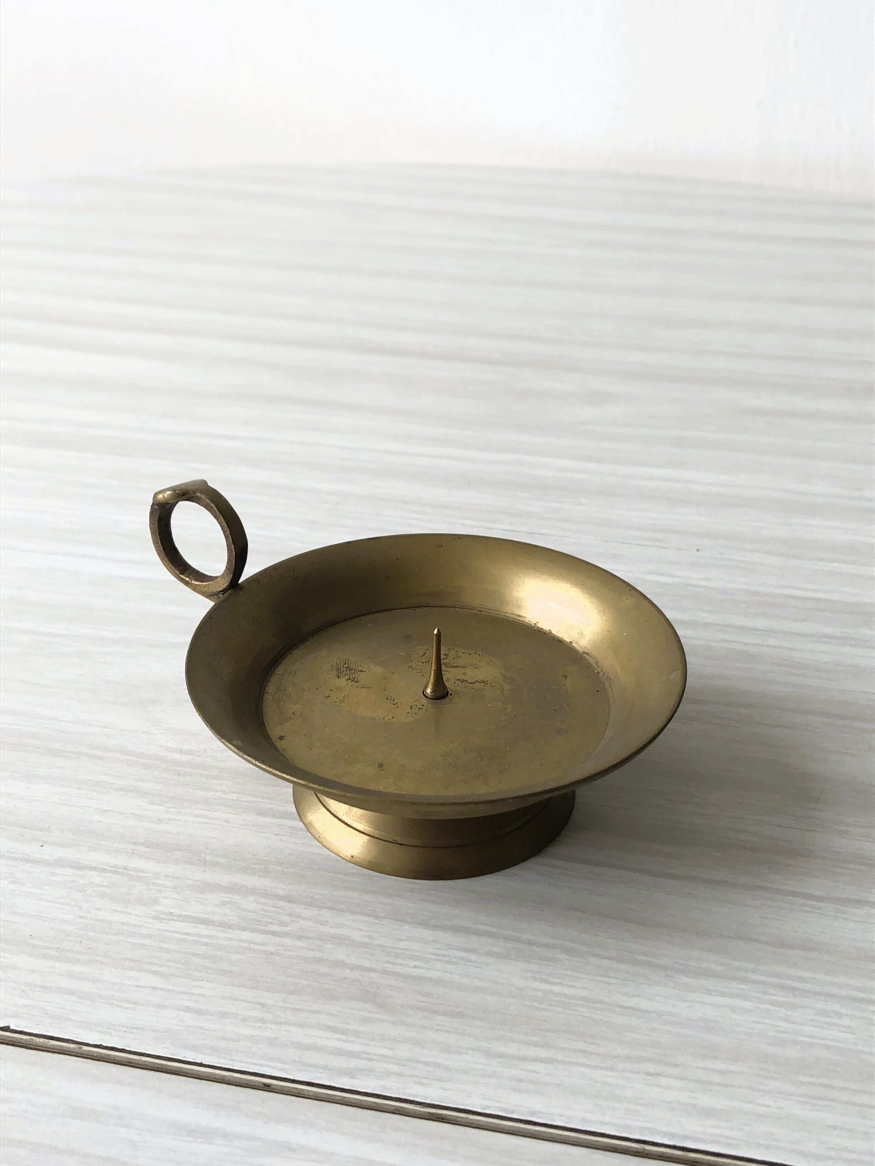 Copper spade candle holder covered with a golden film - handle small ring - for candle with rod