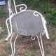 Mategot-style perforated wrought iron garden furniture with table and armchairs