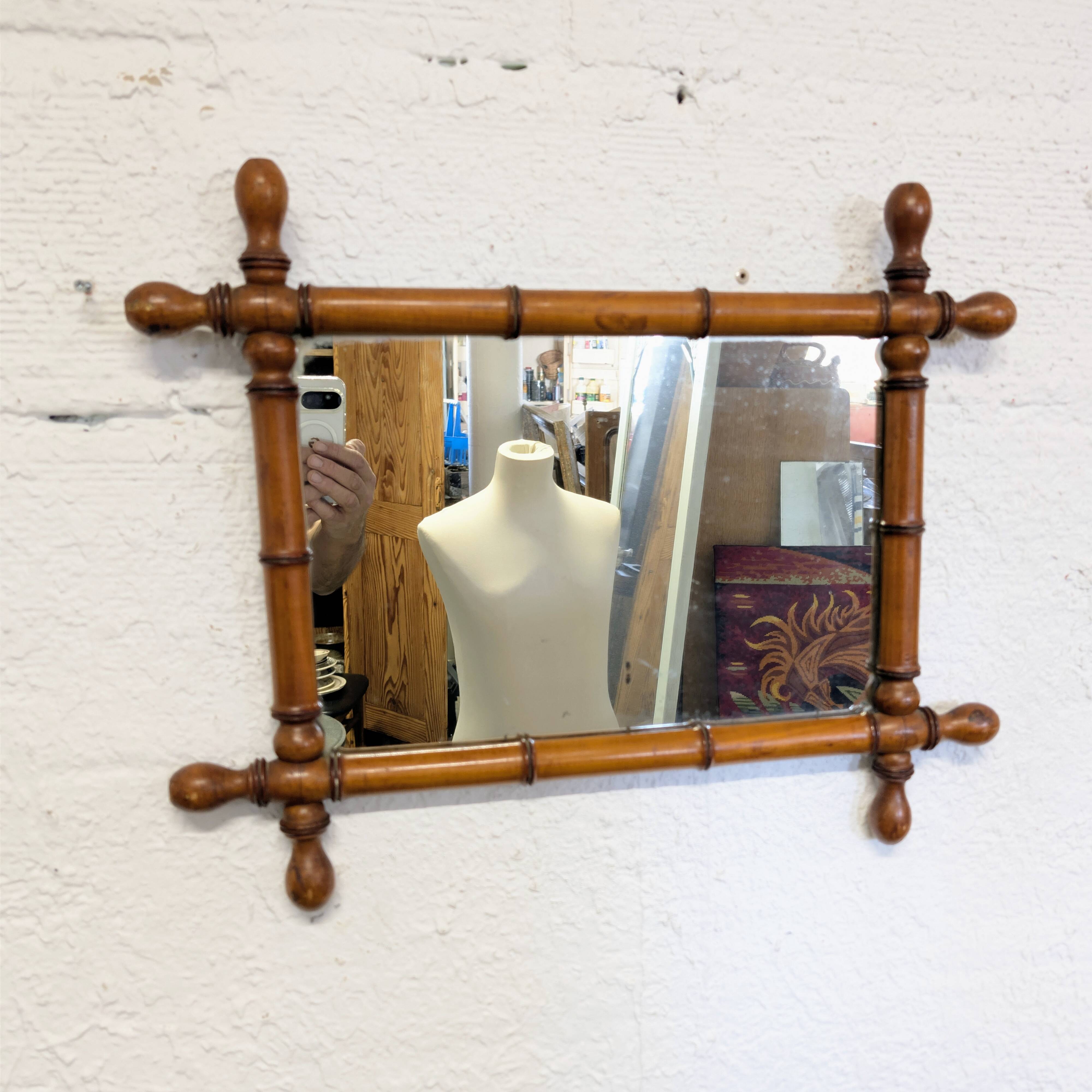 Antique turned wood mirror