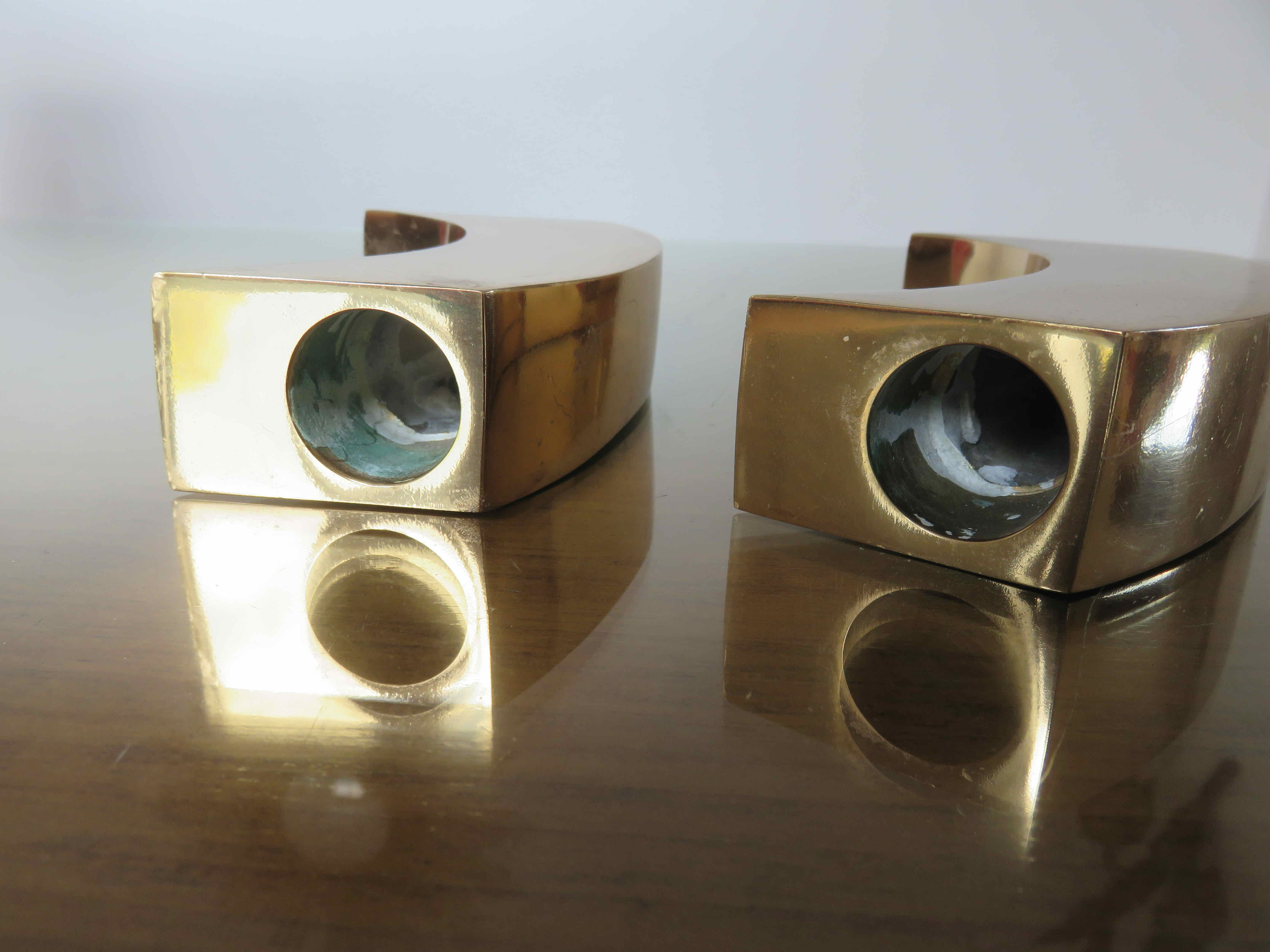 Pair of candle holders in golden brass, 70s
