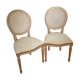 Paire de chaises médaillon à dossier cannage rotin