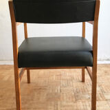 Chair in light teak and black skaï from the 1960s