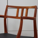 Vintage armchair in teak and black leather - Model 64 - Möller - Denmark '60's