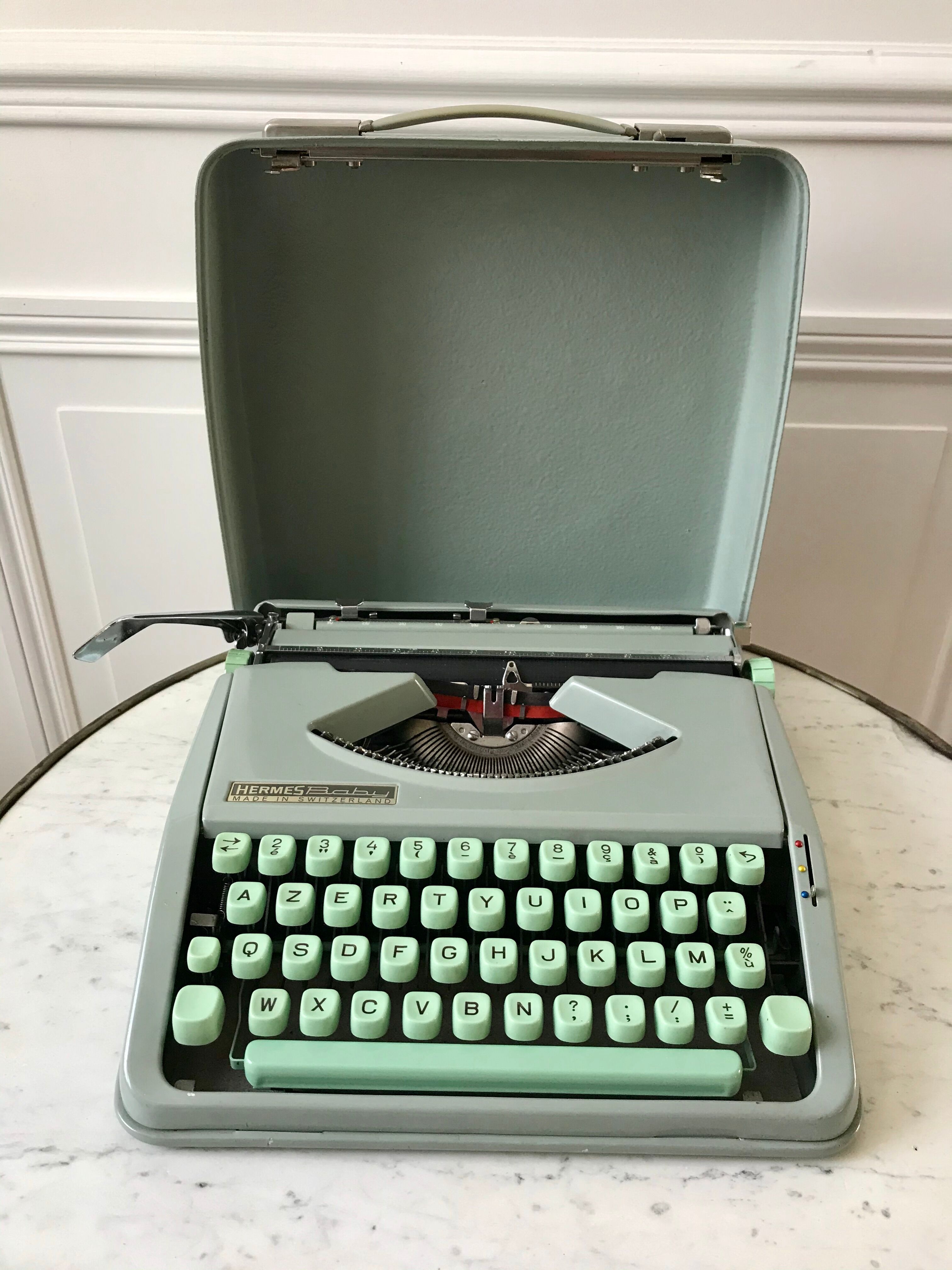 Mint green typewriter hermes baby made in switzerland