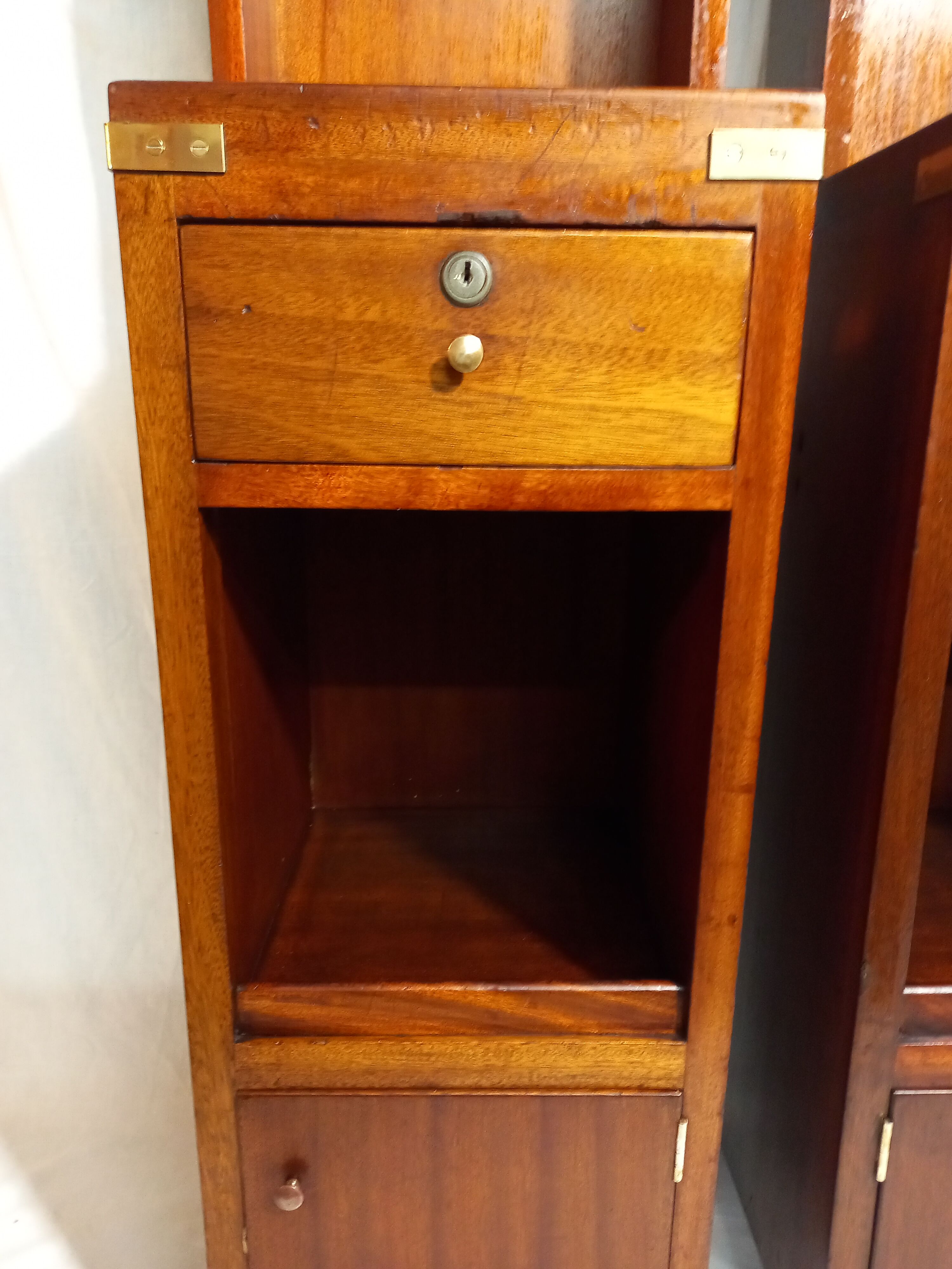 Pair of bedside tables with mahogany and brass shelf