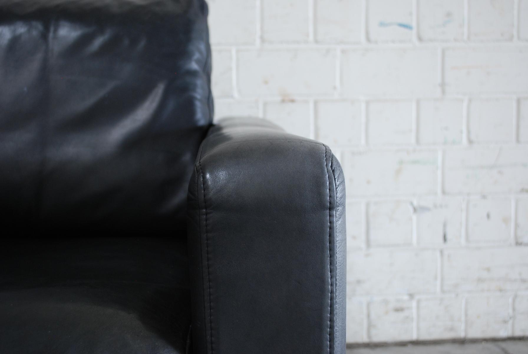 Vintage black leather sofa from Lavalina